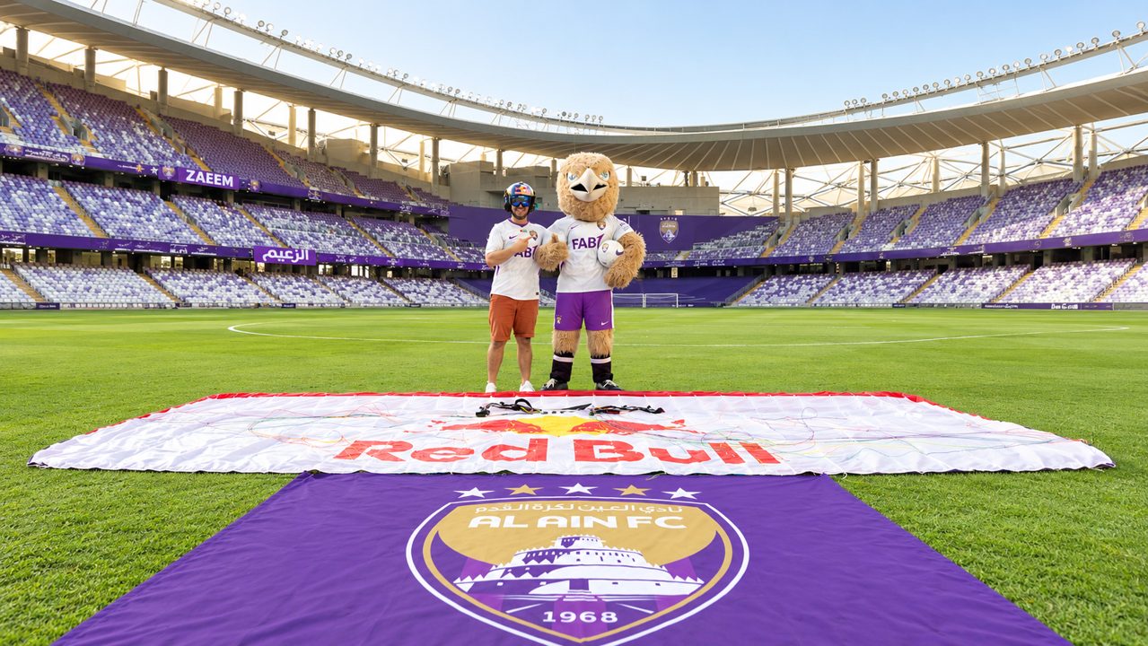 Illustrative adaptation of supplied Red Bull and Al Ain Club partnership photo